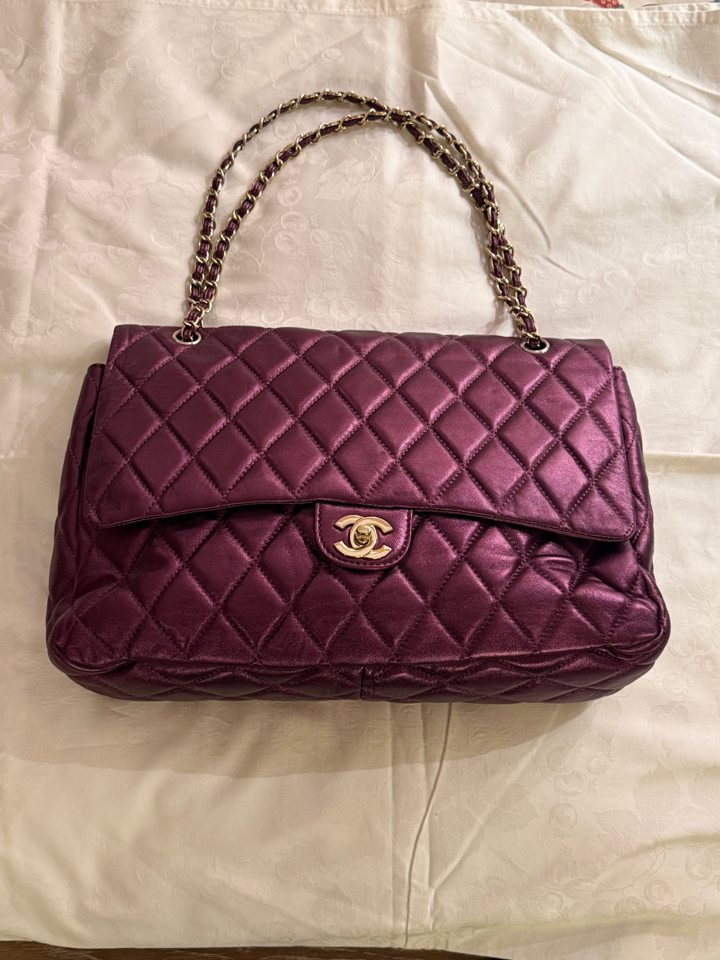 Chanel caviar duffle bag in purple