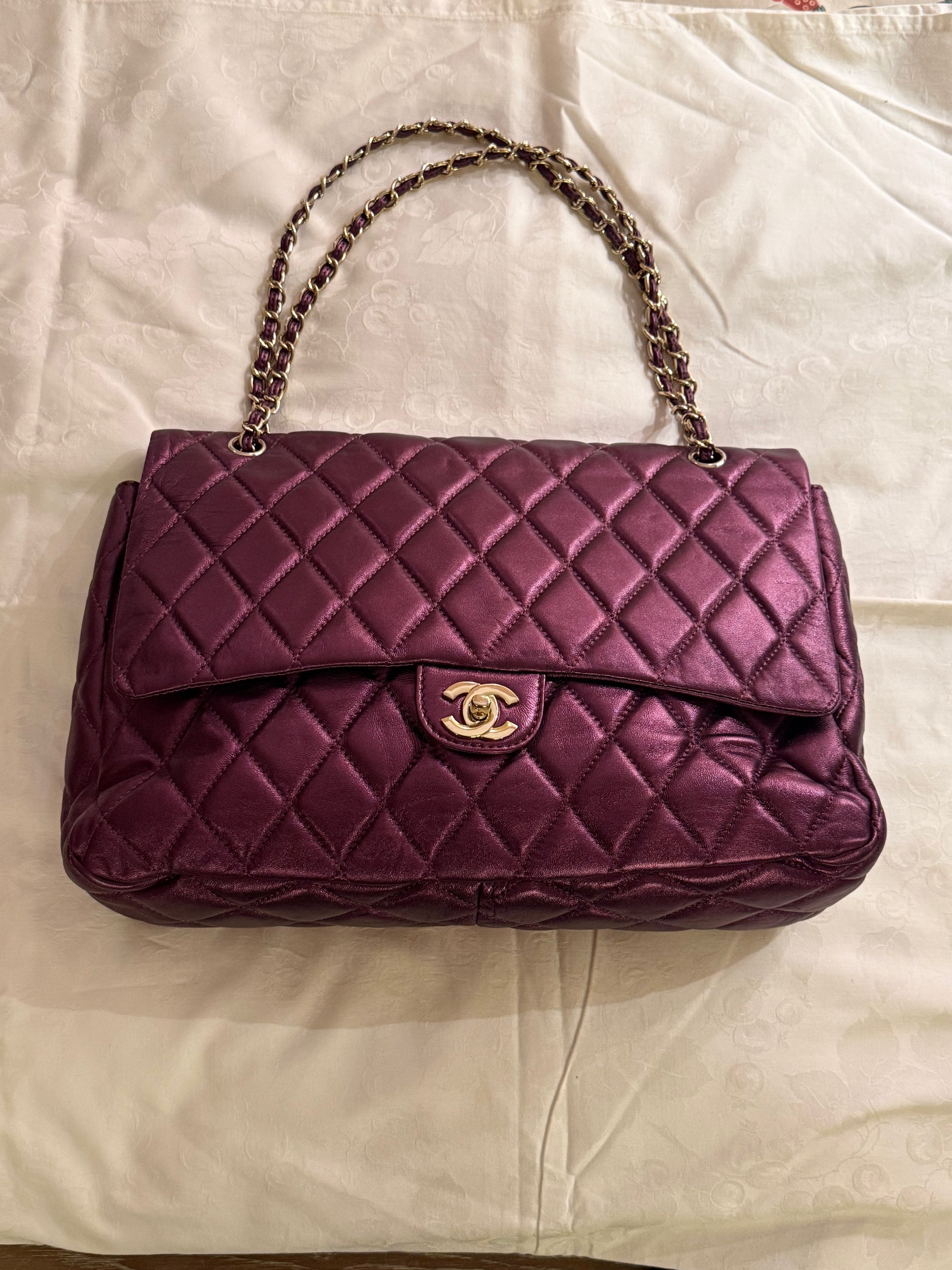Chanel caviar duffle bag in purple