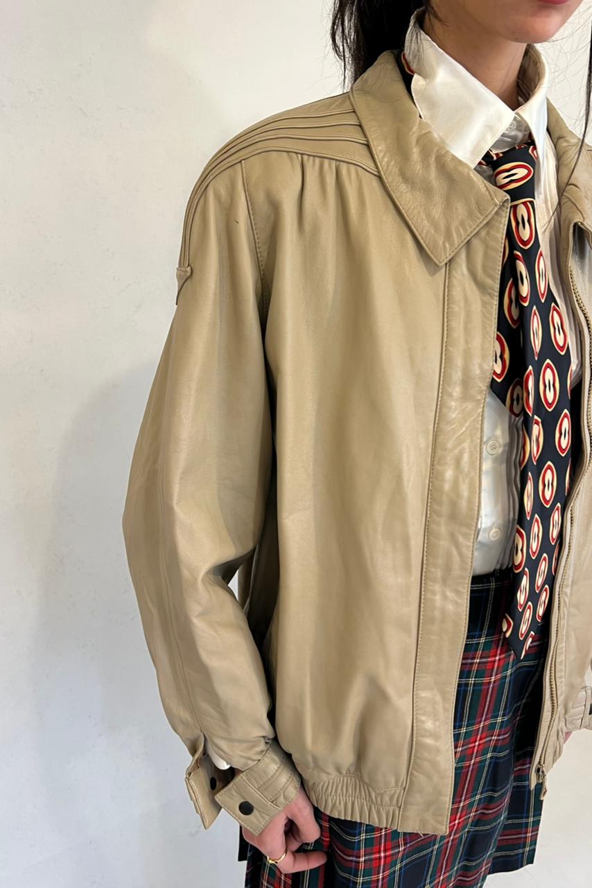 Vintage beige leather bomber jacket