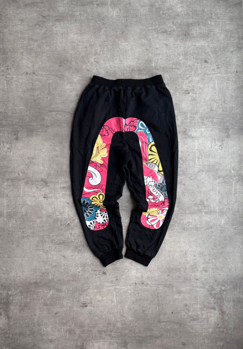 Evisu custom made Daruma Print sweatpants.