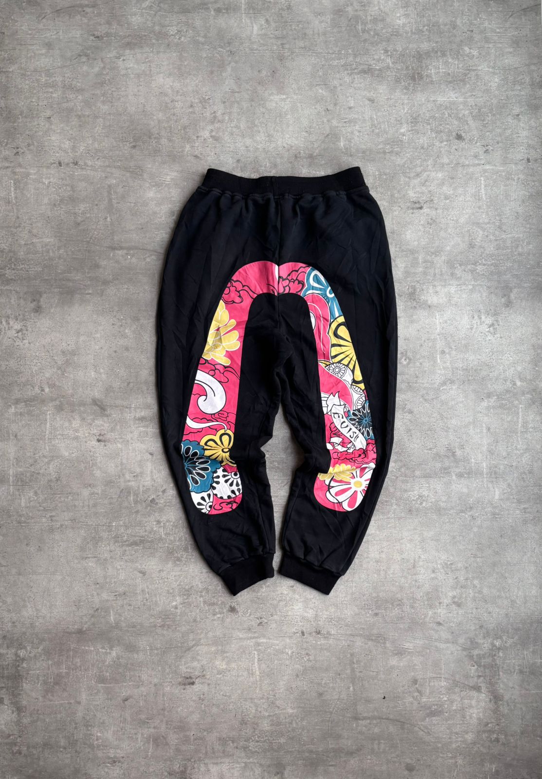 Evisu custom made Daruma Print sweatpants.